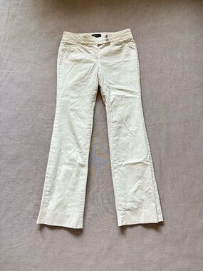 White House Black Market white bootcut pants.